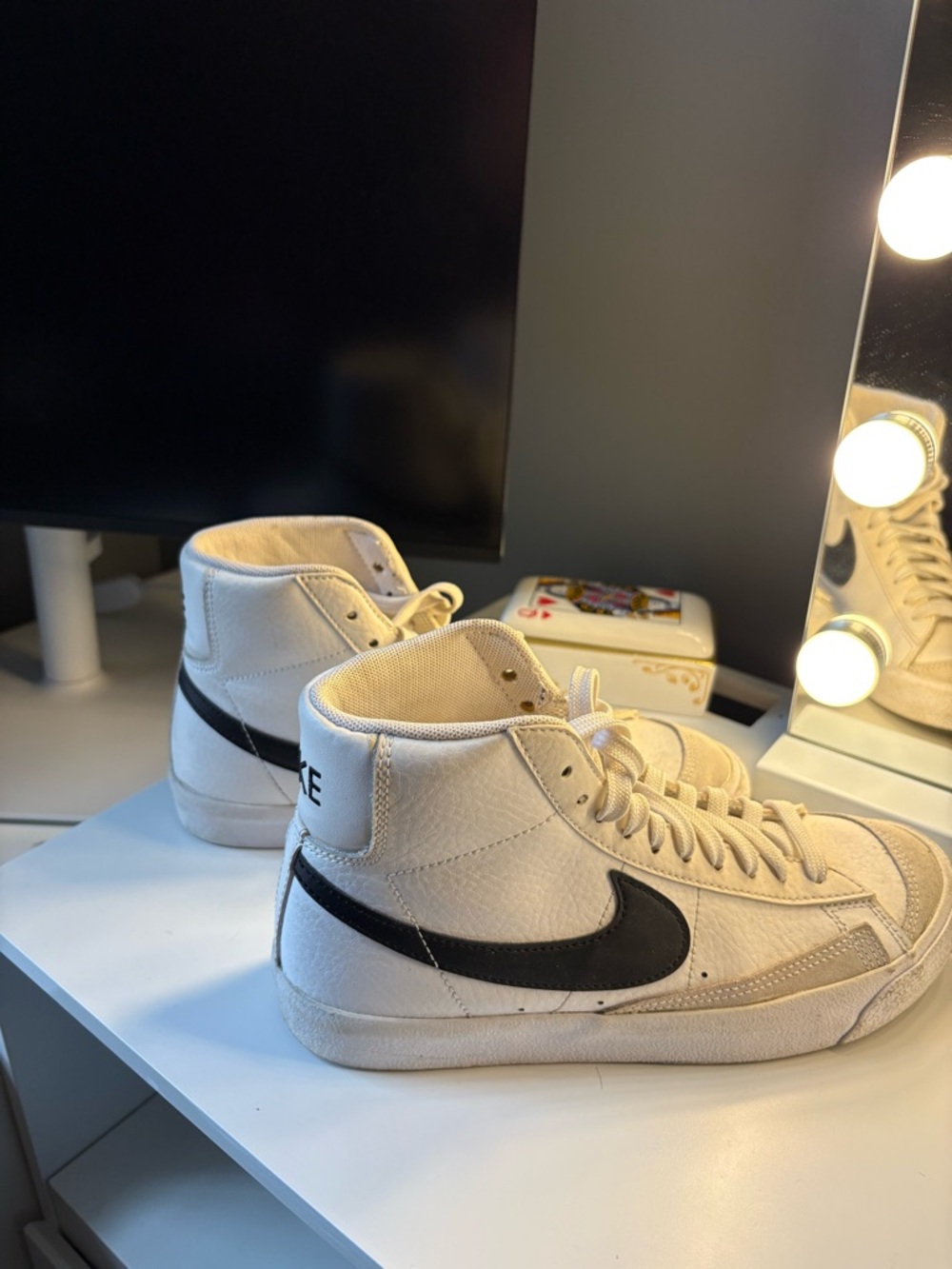 Nike High-Top Sneakers in Off-White with Black Swoosh